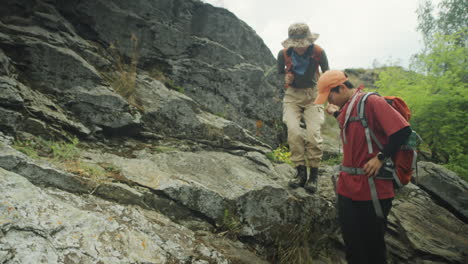 asian female tourists exploring mountain trail
