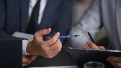 businessman hands writing on a paperwor