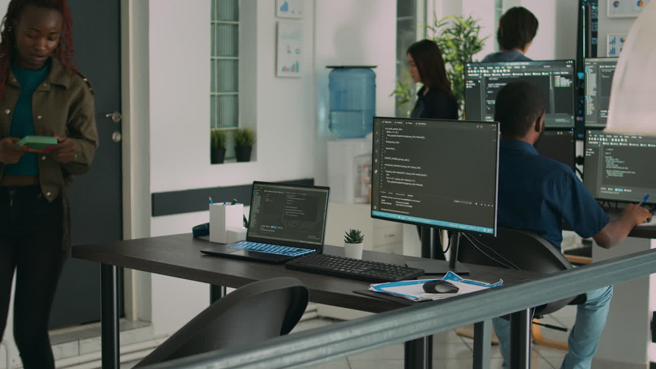 African american coder using computer to write code and develop algorithm program