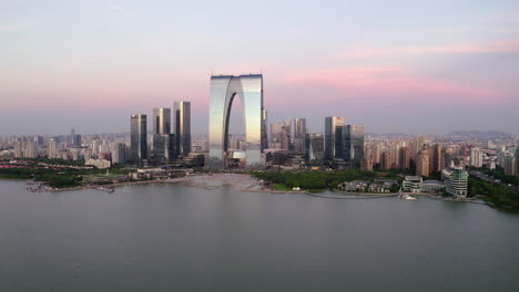 cbd buildings by the lake. aerial in suzhou, china.