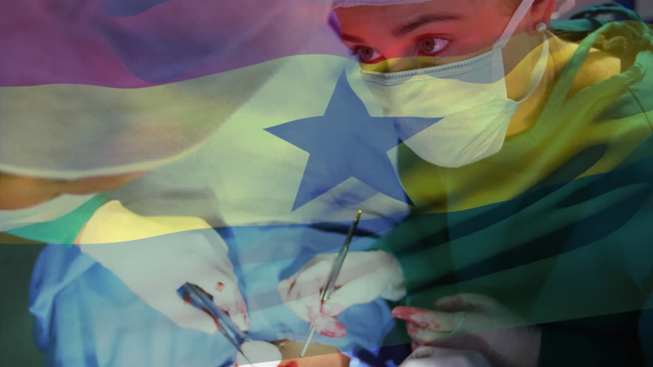 Animation of flag of ghana waving over surgeons in operating theatre