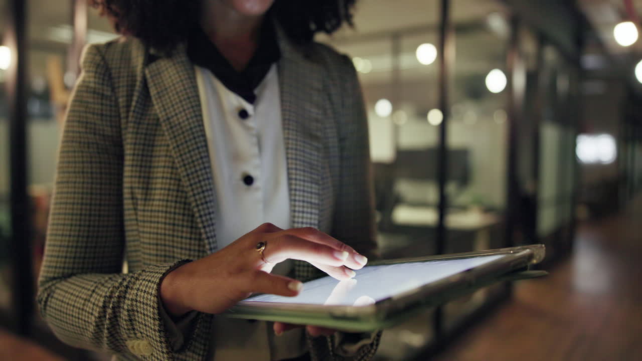 Businesswoman using tablet in office