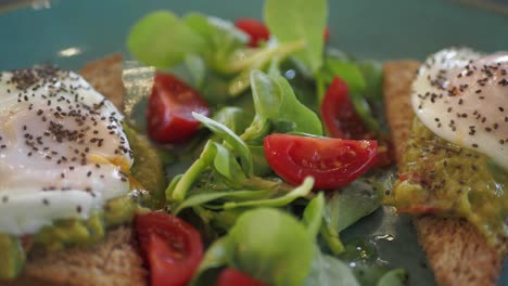 poached egg toast with avocado and salad