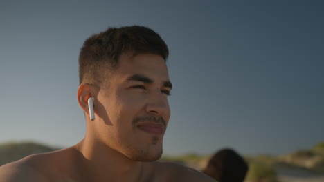 man listening to music outdoors