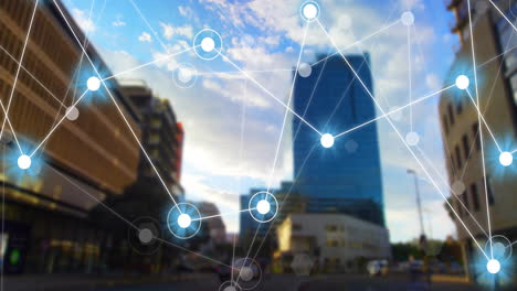animating network connections and data processing over cityscape with tall buildings