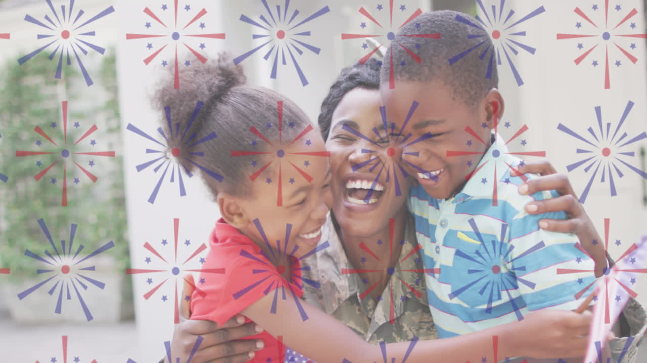 Animação de fogos de artifício sobre feliz mãe soldada afro-americana abraçando os filhos
