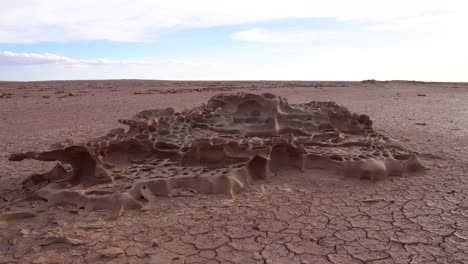 pan right of tafoni formations in a clay pan in namibia