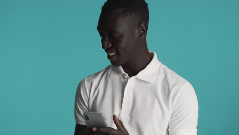 african american man on blue background.