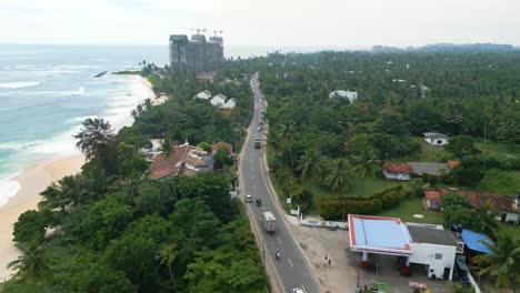 aerial shot over the beach in mirissa, sri lanka