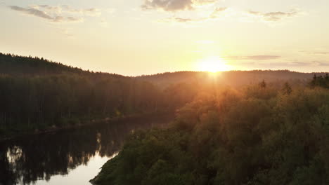 Sunshine-falling-over-a-calm-forest-river