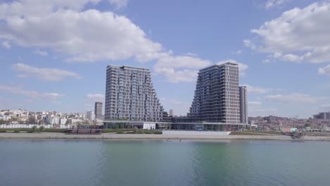 astonishing 4k aerial shot of belgrade waterfront and sava river, summer day