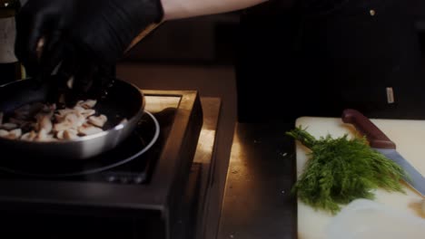 chef preparing vegetables and mushrooms for cooking