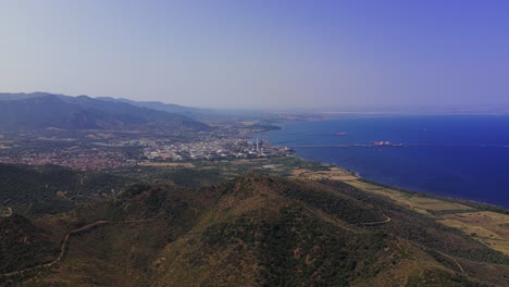 saras oil refinery on coast of sardinia, sarroch, italy. aerial drone panoramic view, copy space