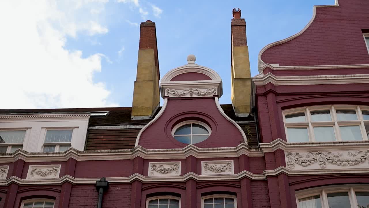 Row of properties along Transept Street in Marylebone showcasing traditional architecture, elegant facades, and the charm of classic London living