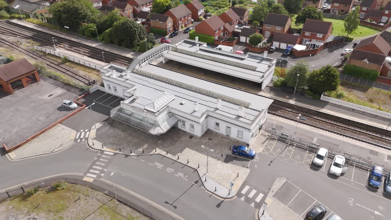 Aerial View of a Train Station and Surrounding Residential Neighborhood