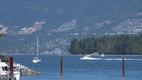 vancouver ocean views and boats. see boats and the pacific ocean withviews of the shoreline and mountains