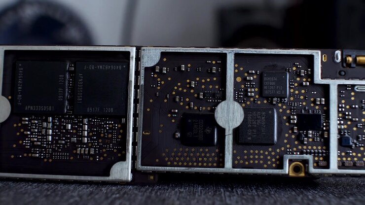 Detailed close-up of thin computer circuit boards showcasing chips and various components. Ideal for technology, electronics, and hardware themes. Dolly right shot