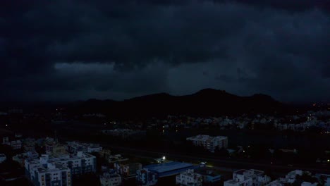 dark stormy night over cityscape