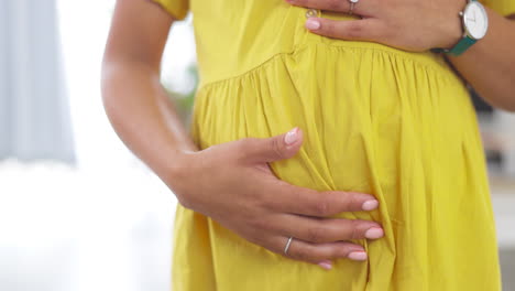 closeup, pregnant and woman touching stomach