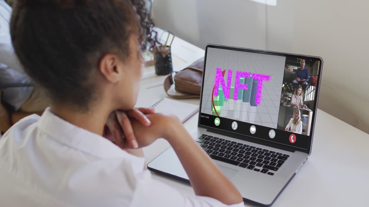 Video of biracial woman having nft video call on laptop with diverse coworkers