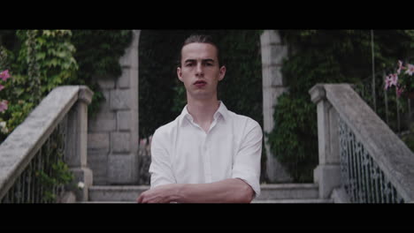 young man in a garden