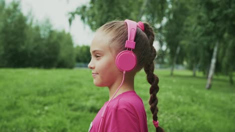 a young girl enjoying music outdoors with pink headphones: a serene moment in nature captured in two frames