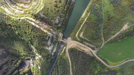 Wide-aerial-spinning-shot,-looking-down-on-the-Everton-Dam-in-Cyprus