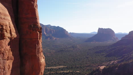 aerial landscape mountain valley with forest and canyon rock at sedona, arizona - drone flying shot