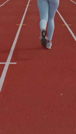 woman running on a track