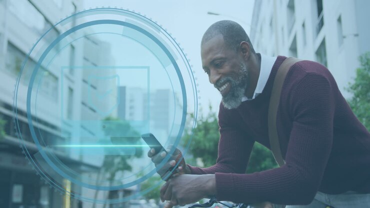 Animation of padlock and data processing over biracial businessman using smartphone