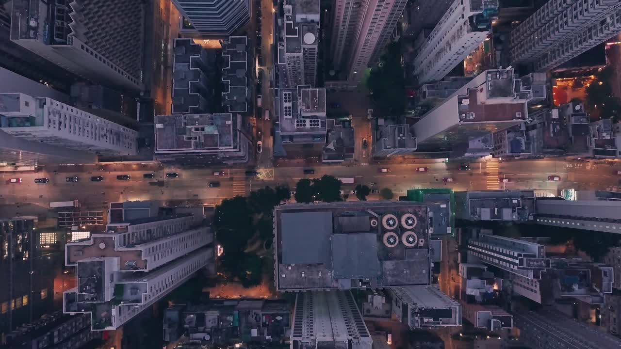 City centre traffic at night in Hong Kong Island Central. Aerial drone view