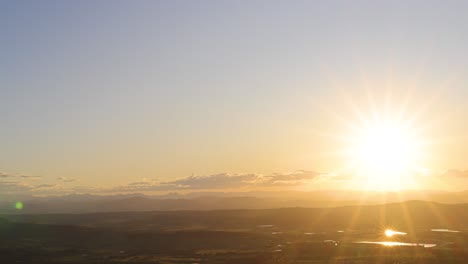 timelapse of sunset descending over a scenic horizon