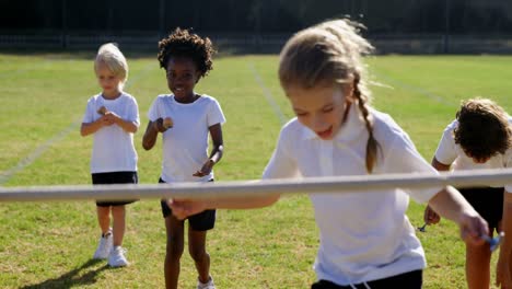 children playing lemon and spoon race