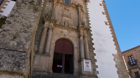 Low-angle-view-of-beautiful-San-Francisco-Javier-Church-in-Caceres,-Tilt-down-shot