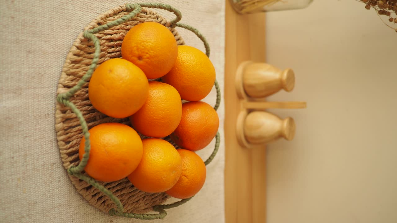 Fresh Oranges in a Woven Basket
