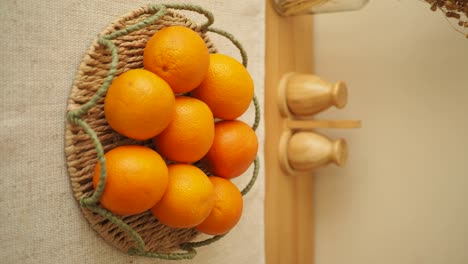 fresh oranges in a woven basket