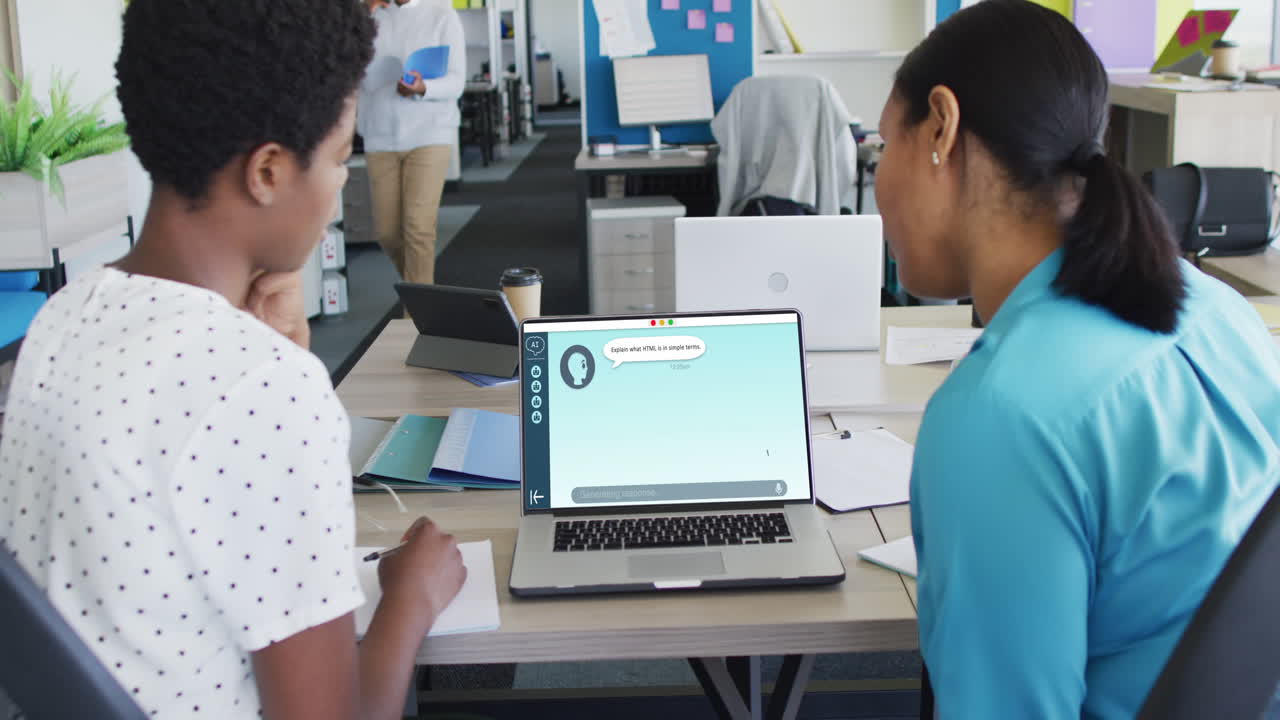 Composition of diverse women using laptop with ai chat on screen