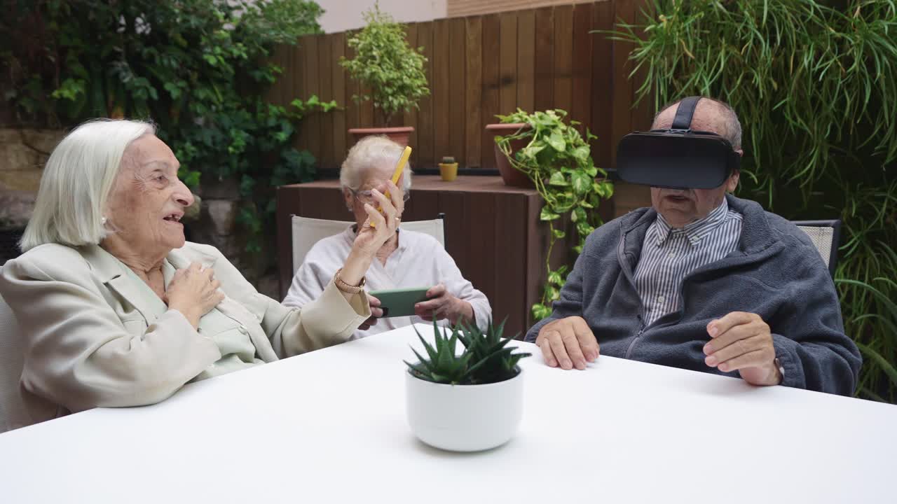 Seniors experiencing virtual reality and technology in a garden setting