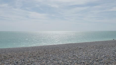 elements of nature such as earth, air, and water are captured on a beach in newhaven