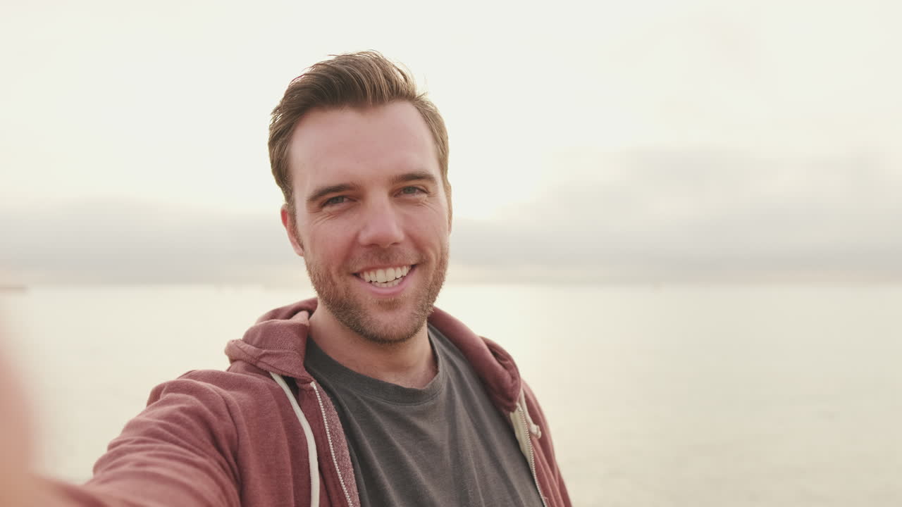 Man taking a selfie at the beach