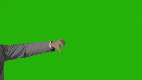 Close-Up-Of-Arm-Of-Businessman-In-Suit-Choosing-Between-Thumbs-Down-And-Down-Gesture-Against-Green-Screen-