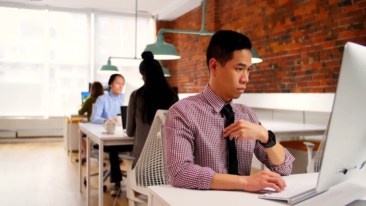 Premium stock video - Man working on computer 4k