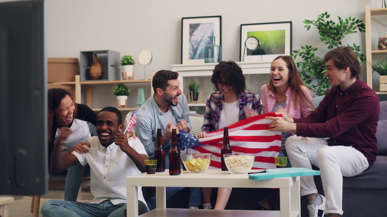 Friends Watching a Game and Celebrating