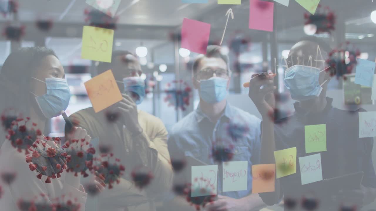 Animation of virus cells over diverse business people with face masks taking notes