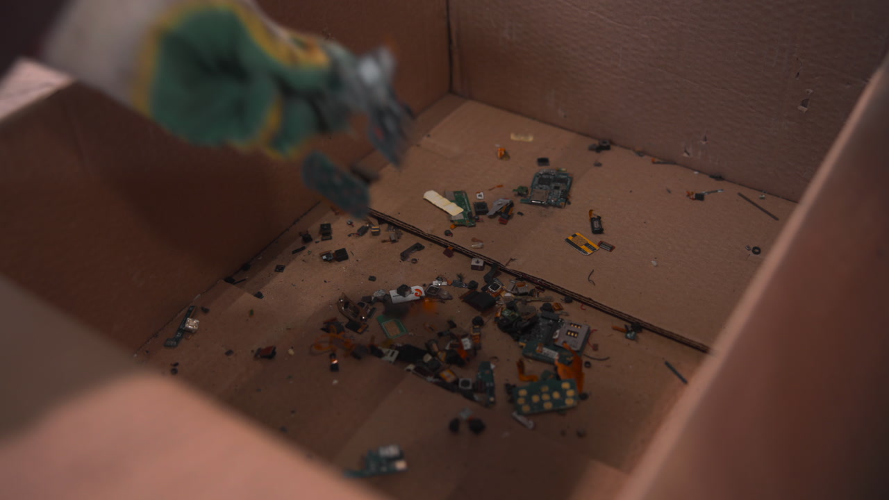 Cardboard Box Filled With Electronic Components And Small Circuit Fragments, Scattered Resistors . Media