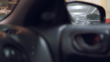 Power-side-mirror-view-at-the-parking.-Moving-mirror.