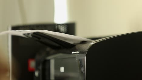 documentation running through feeder tray of photocopier