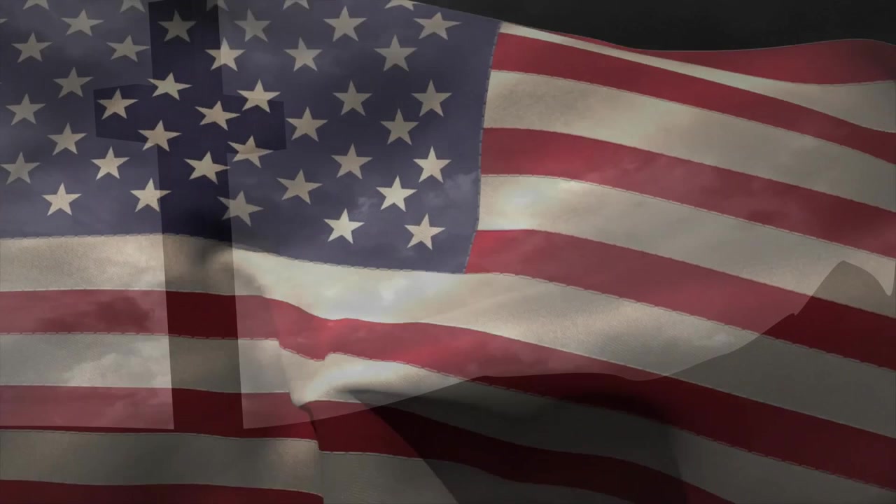 Brise løfter det amerikanske flag, stoffet blafrer og bølger for at demonstrere realistisk bølgebevægelse.