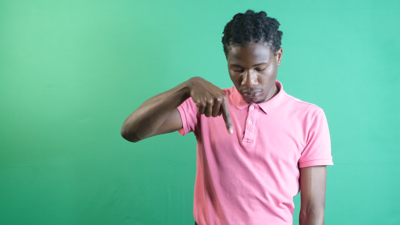 African Man Pointing Down
