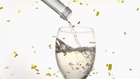 animation of confetti over glass of white wine on white background
